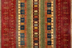 Gabbeh rectangular 8' 4" by 9' 5" rug with geometric pattern from Afghanistan