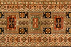 Kazak runner 2' 8" by 9' 9" rug with geometric pattern from Afghanistan - red & ivory